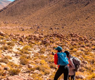Couple hiking in the Atacama Desert.