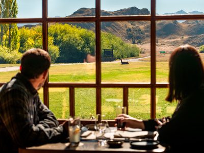 The view from Explora Parque Nacional Patagonia. Travelers watching guanacos from the window