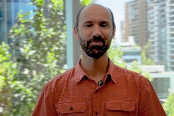 VP of Sustainability, man smiling