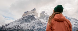 Person looking at the Paine Horns in Torres del Paine.