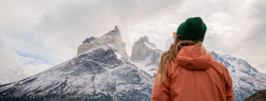 Person looking at the Paine Horns in Torres del Paine.