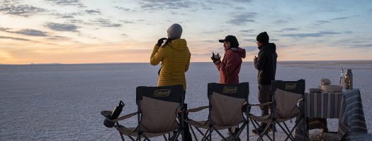 People enjoying buffet in the Uyuni Salt Flat.