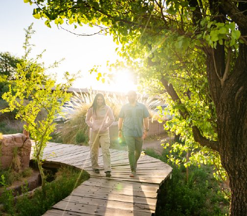 Couple walking through the lodge at Explora Atacama.
