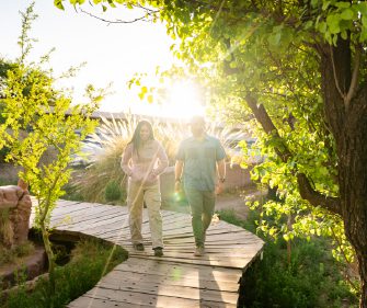 Couple walking through the lodge at Explora Atacama.