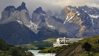 Eco-lodge overlooking Lake Pehoé and the Cuernos del Paine mountains in Torres del Paine National Park