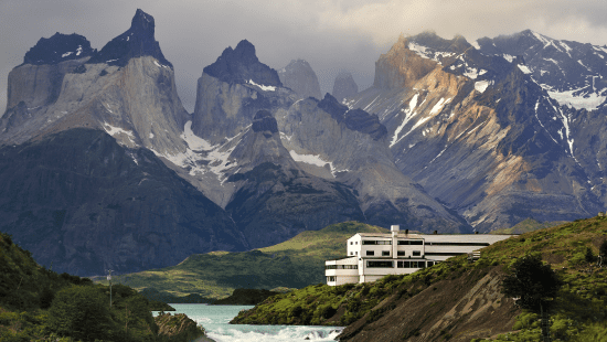 Eco-lodge overlooking Lake Pehoé and the Cuernos del Paine mountains in Torres del Paine National Park